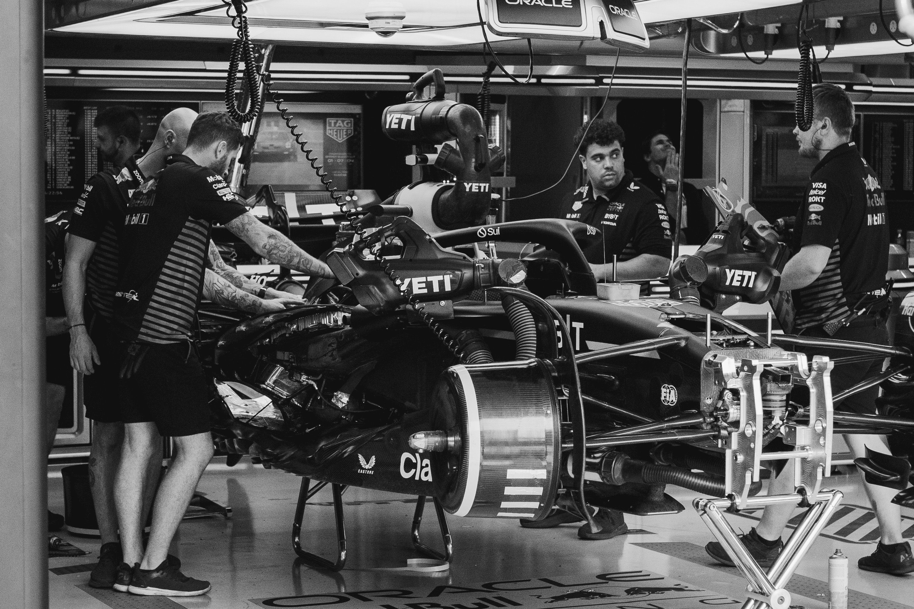 Formula 1 pit crew working together - fan engagement and team identity