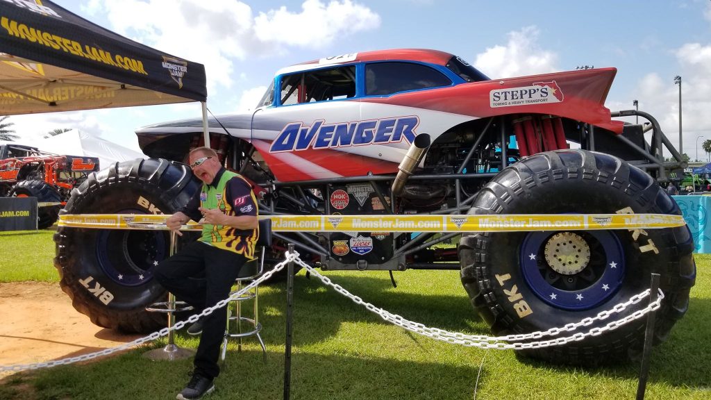 Monster Jam racing driver in bold, eye-catching suit design